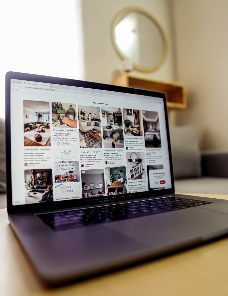 a laptop with a collage on the screen