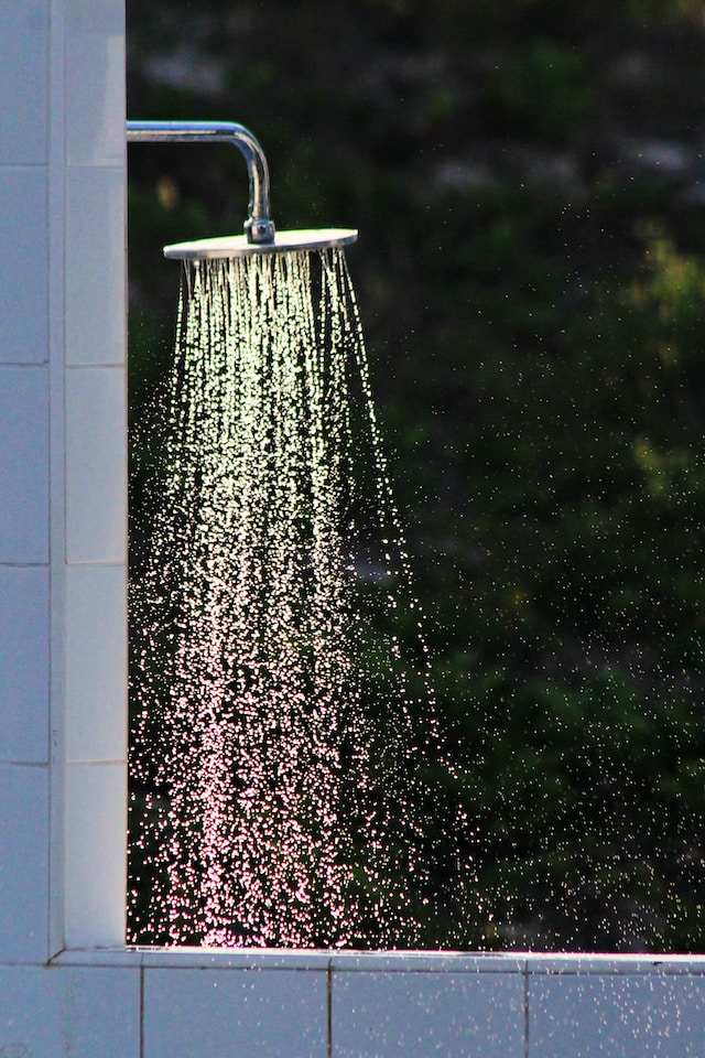 running shower head viewed from the side